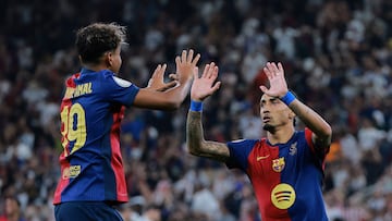Soccer Football - Spanish Super Cup - Final - FC Barcelona v Real Madrid - King Abdullah Sports City, Jeddah, Saudi Arabia - January 12, 2025 FC Barcelona's Raphinha celebrates with Lamine Yamal after scoring their fifth goal REUTERS/Stringer