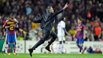 Inter Milan's Portuguese coach Jose Mourinho celebrates after beating Barcelona 3-2 on aggregate.