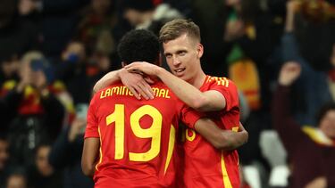 Spain's midfielder #10 Dani Olmo (R) celebrates with Spain's forward #19 Lamine Yamal after scoring his team's second goal during the international friendly football match between Spain and Brazil at the Santiago Bernabeu stadium in Madrid, on March 26, 2024. Spain arranged a friendly against Brazil at the Santiago Bernabeu under the slogan "One Skin" to help combat racism. (Photo by Pierre-Philippe MARCOU / AFP)