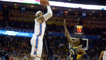 Oct 25, 2017; Oklahoma City, OK, USA; Oklahoma City Thunder forward Carmelo Anthony (7) shoots the ball over Indiana Pacers guard Darren Collison (2) during the fourth quarter at Chesapeake Energy Arena. Mandatory Credit: Mark D. Smith-USA TODAY Sports