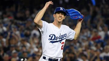 LOS ANGELES, CA - OCTOBER 26: Walker Buehler #21 of the Los Angeles Dodgers reacts after retiring the side on a strike out during the seventh inning against the Boston Red Sox in Game Three of the 2018 World Series at Dodger Stadium on October 26, 2018 in Los Angeles, California.   Harry How/Getty Images/AFP
 == FOR NEWSPAPERS, INTERNET, TELCOS &amp; TELEVISION USE ONLY ==