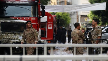 Lebanese army members and emergency workers are seen at the site of Friday's Israeli strike, as search operations continue, in Beirut's southern suburbs, Lebanon September 22, 2024. REUTERS/Amr Abdallah Dalsh