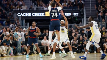 SAN FRANCISCO, CALIFORNIA - APRIL 13: Norman Powell #24 of the LA Clippers makes a three-point basket over Moses Moody #4 of the Golden State Warriors at the buzzer at the end of the first half at Chase Center on April 13, 2025 in San Francisco, California. NOTE TO USER: User expressly acknowledges and agrees that, by downloading and/or using this photograph, user is consenting to the terms and conditions of the Getty Images License Agreement. Ezra Shaw/Getty Images/AFP (Photo by EZRA SHAW / GETTY IMAGES NORTH AMERICA / Getty Images via AFP)