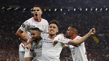 Soccer Football - Europa League - Final - Sevilla v AS Roma - Puskas Arena, Budapest, Hungary - May 31, 2023 Sevilla's Erik Lamela, Youssef En-Nesyri and Lucas Ocampos celebrate after AS Roma's Gianluca Mancini scores an own goal and Sevilla's first REUTERS/Marko Djurica