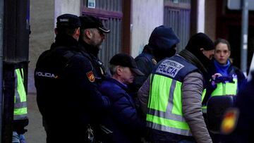 Spanish national police officers lead away a 74-year-old man under arrest on suspicion of being the sender of letter-bombs in November and December to the Ukrainian and U.S. embassies and several institutions in Spain, in Miranda de Ebro, Spain January 25, 2023. REUTERS/Vincent West