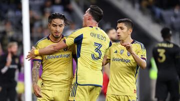 Oct 1, 2023; Los Angeles, California, USA;  Real Salt Lake forward Cristian Arango (9) celebrates with defender Bryan Oviedo (3) and forward Jefferson Savarino (10) after scoring a goal during the second half against the Los Angeles FC at BMO Stadium. Mandatory Credit: Kiyoshi Mio-USA TODAY Sports