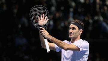 Federer opens ATP finals bid with victory over Sock