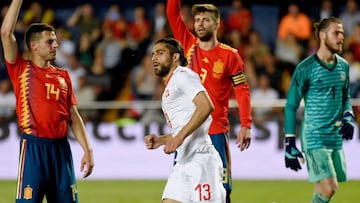 Switzerland&#039;s defender Ricardo Rodriguez (C) celebrates a goal during the international friendly football match between Spain and Switzerland at La Ceramica stadium in Vila-real on June 3, 2018. / AFP PHOTO / JOSE JORDAN