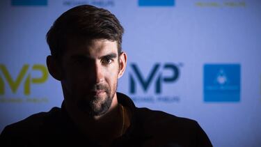 US swimming champion Michael Phelps is pictured during a press conference at the Molitor swimming pool on February 16, 2017 in Paris. / AFP PHOTO / LIONEL BONAVENTURE