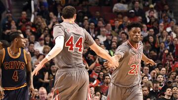 Mar 30, 2017; Chicago, IL, USA; Chicago Bulls forward Jimmy Butler (21) and  forward Nikola Mirotic (44) celebrate a basket during the second half at the United Center. The Bulls won 99-93. Mandatory Credit: David Banks-USA TODAY Sports