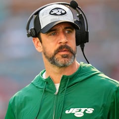 Why do NFL players stay in hotels at home games? Do they share hotel rooms?