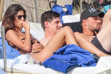 The Real Madrid and Belgium goalkeeper is recharging his batteries on the beaches of the Spanish island Ibiza.