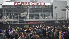 Jan 26, 2020; Los Angeles, CA, USA;  Fans mourn the loss of NBA legend Kobe Bryant outside of the Staples Center in Los Angeles. Mandatory Credit: Harrison Hill-USA TODAY