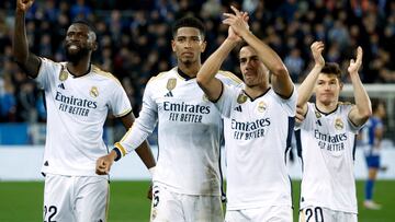 Soccer Football - LaLiga - Deportivo Alaves v Real Madrid - Estadio Mendizorroza, Vitoria-Gasteiz, Spain - December 21, 2023 Real Madrid's Jude Bellingham, Lucas Vazquez and Antonio Rudiger celebrate after the match REUTERS/Vincent West