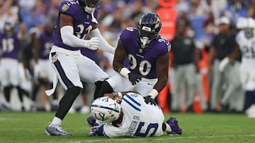 BALTIMORE, MARYLAND - AUGUST 07: Quarterback Anthony Richardson Sr. #5 of the Indianapolis Colts lays on the ground after being sacked by linebacker David Ojabo #90 of the Baltimore Ravens in the first half during the NFL Preseason 2025 game between Indianapolis Colts and Baltimore Ravens at M&T Bank Stadium on August 7, 2025 in Baltimore, Maryland. Patrick Smith/Getty Images/AFP (Photo by Patrick Smith / GETTY IMAGES NORTH AMERICA / Getty Images via AFP)