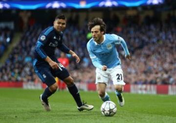 David Silva takes the ball past Casemiro.