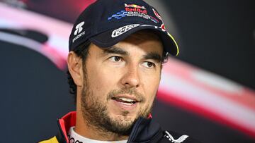 Third-placed Red Bull Racing's Mexican driver Sergio Perez speaks during a press conference after the Formula One Chinese Grand Prix at the Shanghai International Circuit in Shanghai on April 21, 2024. (Photo by GREG BAKER / AFP)