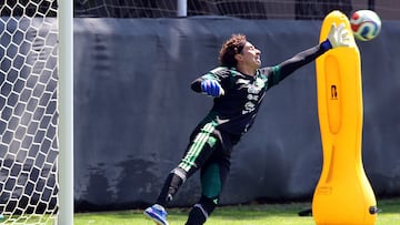 Mexico's goalkeeper Guillermo Ochoa stops the ball during a training session in Mexico City on March 26, 2026. Mexico will play a friendly match against Portugal on March 28 at the Banorte Stadium (formerly known as Azteca Stadium) in Mexico City. (Photo by Luis CORTES / AFP)