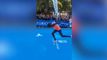 Marathon runner hits wall yards from finish, crawls over line - and drops from second to fourth