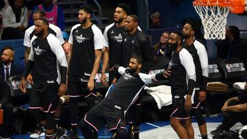 Feb 17, 2019; Charlotte, NC, USA; Team Lebron guard Kyrie Irving of the Boston Celtics (11) reacts on the Team Lebron bench during the All Star Game at Spectrum Center. Mandatory Credit: Jeremy Brevard-USA TODAY Sports