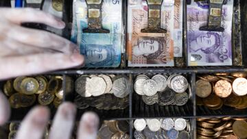A cash tray holding British pound banknotes and coins in a shop in Barking, UK, on Tuesday, Sept. 13, 2022. As the UK enters a period of public mourning after the death of Queen Elizabeth II, data releases are likely to show a temporary reprieve in inflation and a jump in wage growth. Photographer: Chris Ratcliffe/Bloomberg via Getty Images
