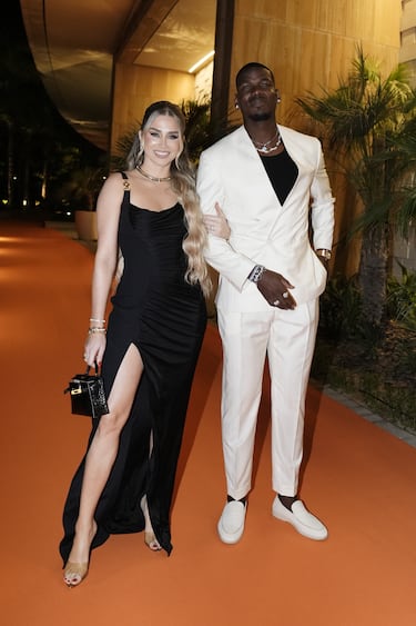 Paul Pogba y María Zulay Salaues.