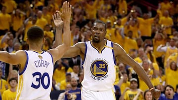 OAKLAND, CA - JUNE 04: Stephen Curry #30 and Kevin Durant #35 of the Golden State Warriors react to a play against the Cleveland Cavaliers in Game 2 of the 2017 NBA Finals at ORACLE Arena on June 4, 2017 in Oakland, California. NOTE TO USER: User expressl
