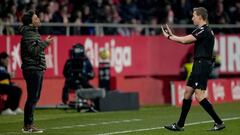 GIRONA, SPAIN - FEBRUARY 17: Referee Valentin Pizarro Gomez calms down Joan Francesc Ferrer "Rubi" of UD Almeriaduring the LaLiga Santander match between Girona FC and UD Almeria at Montilivi Stadium on February 17, 2023 in Girona, Spain. (Photo by Alex Caparros/Getty Images)