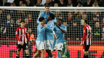 Soccer Football - Premier League - Brentford v Nottingham Forest - GTech Community Stadium, London, Britain - December 21, 2024 Nottingham Forest's Ola Aina celebrates scoring their first goal with teammates Action Images via Reuters/Cat Goryn EDITORIAL USE ONLY. NO USE WITH UNAUTHORIZED AUDIO, VIDEO, DATA, FIXTURE LISTS, CLUB/LEAGUE LOGOS OR 'LIVE' SERVICES. ONLINE IN-MATCH USE LIMITED TO 120 IMAGES, NO VIDEO EMULATION. NO USE IN BETTING, GAMES OR SINGLE CLUB/LEAGUE/PLAYER PUBLICATIONS. PLEASE CONTACT YOUR ACCOUNT REPRESENTATIVE FOR FURTHER DETAILS..