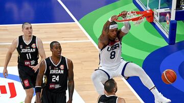 USA�s Paolo Banchero (R) dunks the ball during the FIBA Basketball World Cup group C match between USA and Jordan  at Mall of Asia Arena in Pasay, Metro Manila on August 30, 2023. (Photo by JAM STA ROSA / AFP)
