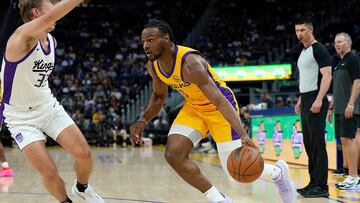 SAN FRANCISCO, CALIFORNIA - JULY 06: Bronny James Jr. #9 of the Los Angeles Lakers drives to the basket on Dane Goodwin #33 of the Sacramento Kings during the second half of a 2024 California Classic summer league game at Chase Center on July 06, 2024 in San Francisco, California. NOTE TO USER: User expressly acknowledges and agrees that, by downloading and or using this photograph, User is consenting to the terms and conditions of the Getty Images License Agreement. Thearon W. Henderson/Getty Images/AFP (Photo by Thearon W. Henderson / GETTY IMAGES NORTH AMERICA / Getty Images via AFP)