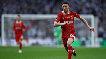 (FILES) Liverpool's Portuguese striker #20 Diogo Jota runs with the ball during the English League Cup final football match between Liverpool and Newcastle United at Wembley Stadium, north-west London on March 16, 2025. Liverpool striker Diogo Jota died along with his brother early July 3, 2025 in a road accident in northwest Spain, the Spanish Civil Guard said. The accident occurred around 12:30 a.m. on a highway in the province of Zamora. The vehicle "left the road" before bursting into flames, the Civil Guard said, adding that the two passengers, Diogo Jota and his brother Andre Felipe, also a professional footballer, were deceased. (Photo by HENRY NICHOLLS / AFP) / RESTRICTED TO EDITORIAL USE. No use with unauthorized audio, video, data, fixture lists, club/league logos or 'live' services. Online in-match use limited to 120 images. An additional 40 images may be used in extra time. No video emulation. Social media in-match use limited to 120 images. An additional 40 images may be used in extra time. No use in betting publications, games or single club/league/player publications. /