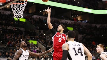 Feb 2, 2017; San Antonio, TX, USA; Philadelphia 76ers center Jahlil Okafor (8) shoots the ball over San Antonio Spurs center Dewayne Dedmon (3) during the first half at AT&amp;T Center. Mandatory Credit: Soobum Im-USA TODAY Sports