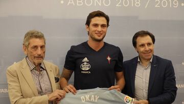 Okay Yokuslu, junto a Carlos Mouriño y Felipe Miñambres.