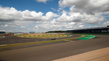 Renault's French driver Esteban Ocon steers his car during the qualifying session for the Formula One British Grand Prix at the Silverstone motor racing circuit in Silverstone, central England on August 1, 2020. (Photo by ANDREW BOYERS / POOL / AFP)