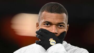 Real Madrid's French forward #09 Kylian Mbappe warms up ahead of the UEFA Champions League football match between Liverpool and Real Madrid at Anfield in Liverpool, north west England on November 27, 2024. (Photo by Oli SCARFF / AFP)
