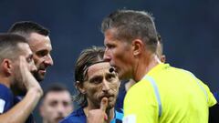 LUSAIL CITY, QATAR - DECEMBER 13: Daniele Orsato referee match and Luka Modrić of Croatia seen during the FIFA World Cup Qatar 2022 semi final match between Argentina and Croatia at Lusail Stadium on December 13, 2022 in Lusail City, Qatar. (Photo by Amin Mohammad Jamali/Getty Images)