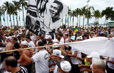 Pelé funeral procession: thousands turn out for Brazil legend’s final journey