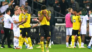 Dortmund's English midfielder Jude Bellingham (C) reacts after the German first division Bundesliga football match Borussia Moenchengladbach v BVB Borussia Dortmund in Moenchengladbach, western Germany, on September 25, 2021. (Photo by UWE KRAFT / AF