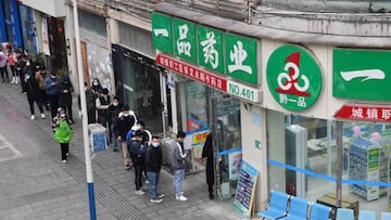ZUNYI, CHINA - DECEMBER 20, 2022 - People wait in line to buy limited-price COVID-19 antigen test kits in Zunyi, Guizhou province, China, December 20, 2022. (Photo credit should read CFOTO/Future Publishing via Getty Images)