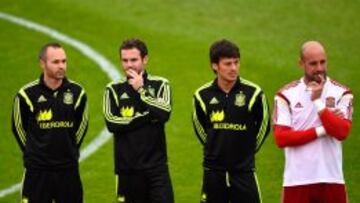 Iniesta, Mata, Silva y Reina.