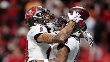 Sep 7, 2025; Atlanta, Georgia, USA; Tampa Bay Buccaneers wide receiver Mike Evans (13) celebrates with wide receiver Emeka Egbuka (2) after a touchdown against the Atlanta Falcons during the fourth quarter at Mercedes-Benz Stadium. Mandatory Credit: Brett Davis-Imagn Images