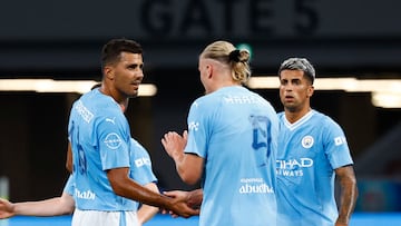 Soccer Football - Pre Season Friendly - Yokohama F Marinos v Manchester City - Japan National Stadium, Tokyo, Japan - July 23, 2023 Manchester City's Rodri celebrates scoring their fourth goal with Erling Braut Haaland REUTERS/Kim Kyung-Hoon