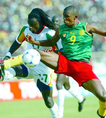 Samuel Eto'o in Cameroon's sleeveless 2002 Africa Cup of Nations shirt.