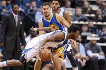 Andrew Wiggins y Klay Thompson.