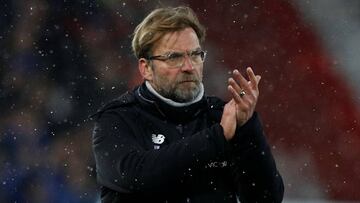 Soccer Football - Premier League - Liverpool vs Everton - Anfield, Liverpool, Britain - December 10, 2017 EvertonLiverpool manager Juergen Klopp applauds fans after the match REUTERS/Phil Noble EDITORIAL USE ONLY. No use with unauthorized audio, video, data, fixture lists, club/league logos or "live" services. Online in-match use limited to 75 images, no video emulation. No use in betting, games or single club/league/player publications. Please contact your account representative for further details.