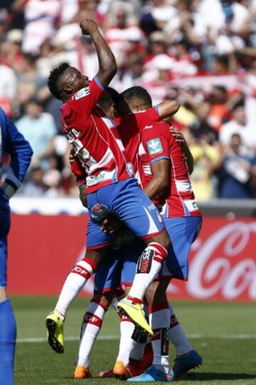 El Arabi (Granada CF) y Lass (Granada CF) celebran el 2-0