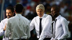 MARSEILLE, FRANCE - JULY 07:   Arsenal manager Arsene Wenger speaks on camera next to former footballers Robert Pires and Eric Abidal before the UEFA EURO semi final match between Germany and France at Stade Velodrome on July 7, 2016 in Marseille, France.  (Photo by Alex Livesey/Getty Images)