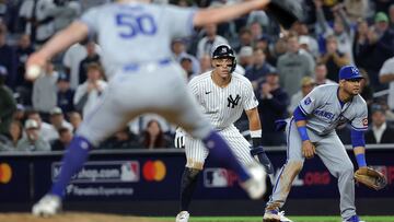 Oct 7, 2024; Bronx, New York, USA; New York Yankees outfielder Aaron Judge (99) leads off first base as Kansas City Royals pitcher Kris Bubic (50) throws a pitch in the eighth inning during game two of the ALDS for the 2024 MLB Playoffs at Yankee Stadium. Mandatory Credit: Brad Penner-Imagn Images