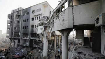 FILE PHOTO: Palestinians inspect the damages at Al Shifa Hospital after Israeli forces withdrew from the Hospital and the area around it following a two-week operation, amid the ongoing conflict between Israel and Hamas, in Gaza City April 1, 2024. REUTERS/Dawoud Abu Alkas/File Photo